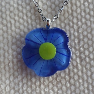 Small blue flower pendant in fused glass