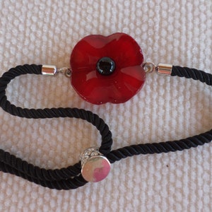 Glass poppy adjustable nylon cord bracelet