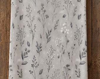 May include: A rectangular kitchen towel featuring a light gray background with a repeating pattern of dark gray and white botanical illustrations, including various sprigs, leaves, and small floral elements hanging from a dark metal bar.