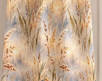 May include: A rectangular kitchen towel hanging on a horizontal bar, featuring a repeating watercolor-style print of golden wheat stalks and tall grasses set against a soft, muted blue and cream background with a light, airy aesthetic.