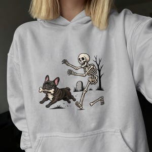 Skeleton Chasing Corgi Hoodie | Halloween Skull Graveyard Sweatshirt