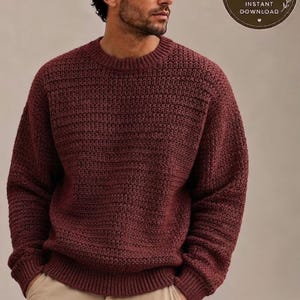 Pode incluir: Uma camisola de manga comprida cor de vinho com um padrão de malha texturizado, gola redonda e punhos e bainha canelados. Um emblema circular no canto superior direito contém o texto PDF PATTERN INSTANT DOWNLOAD com um pequeno ícone de folha.