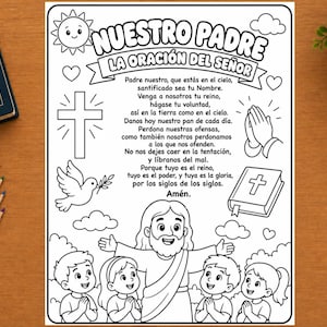 Op de afbeelding: Een zwart-wit kleurplaat met het Onze Vader in het Spaans, getiteld "NUESTRO PADRE LA ORACIÓN DEL SEÑOR." De pagina bevat illustraties van een kruis, een duif, biddende handen, een bijbel en een centrale figuur met kinderen.