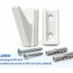 May include: A white wall-mounted hook with a separate mounting bracket, two silver-coloured countersunk screws, and two grey wall plugs. The included hardware is labelled as 2x wall plug 6x40 mm and 2x countersunk screw 6x40 mm zinc plated.