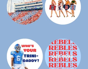 May include: Four circular stickers featuring Ole Miss themes. One shows a stadium with the text Home of the Ole Miss Rebels, another depicts four women holding bags spelling REBS, one shows a football player with the text Who's Your Trini-Daddy?, and one features the word Rebels repeated in red.