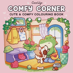 May include: A coloring book titled COMFY CORNER CUTE & COMFY COLOURING BOOK by CocoWyo. The cover features a cartoon illustration of a green dinosaur hugging a brown and white puppy in a room with a yellow coat, a hat, flowers, and an umbrella.