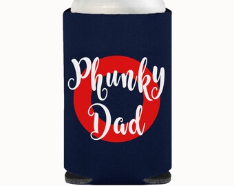 May include: A navy blue can cooler with a red circle and the text "Phunky Dad" in white.