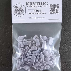 May include: A clear plastic bag containing 100 assorted light grey miniature resin pieces. The header card features the text KRYTHIC WORKSHOP, KING'S TREASURE PACK, 100 ASSORTED PIECES, a skull and mushroom logo, and a QR code. The pieces include chests, coins, and various items.