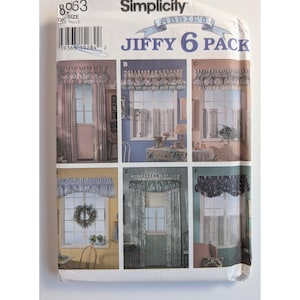 May include: A Simplicity sewing pattern envelope for Abbie's Jiffy 6 Pack, featuring illustrations of six different window curtain and valance styles labeled A through F. The white paper packaging displays a barcode and the number 8063.