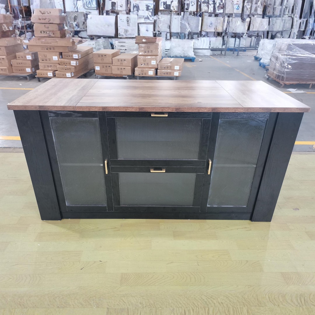 Large Kitchen Island With Seating and Storage Cabinets Serves as A ...