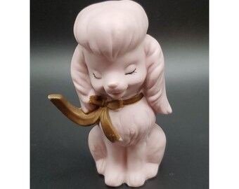 Vintage keramische roze zittende hond met gouden lint gemaakt in Japan