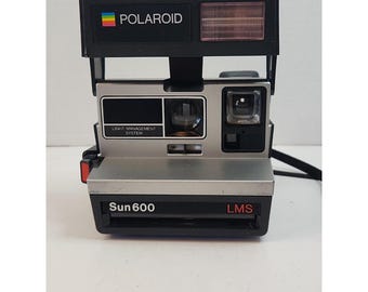Polaroid Sun 600 LMS Instant Film Camera Black Silver Untested For Parts Repair