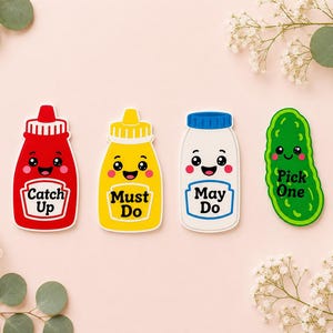 May include: Four die-cut stickers featuring cartoon characters with smiling faces. The red ketchup bottle says Catch Up, the yellow mustard bottle says Must Do, the white mayonnaise jar says May Do, and the green pickle says Pick One.