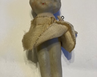 Bisque Frozen Charlotte doll