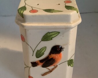 Shaker vintage avec oiseau