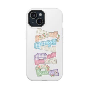 May include: A white smartphone case featuring the word PRAY in large, vertical, patchwork-style letters. Each letter is composed of different fabric patterns, including floral prints, blue and white gingham, and polka dots with visible stitching.