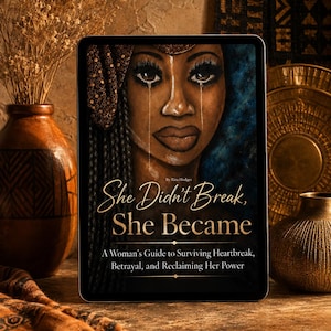 May include: A digital tablet displaying a book cover titled She Didn't Break, She Became by Rita Hodges. The cover features a portrait of a person with long braids and tears on their face. The subtitle reads A Woman's Guide to Surviving Heartbreak, Betrayal, and Reclaiming Her Power.