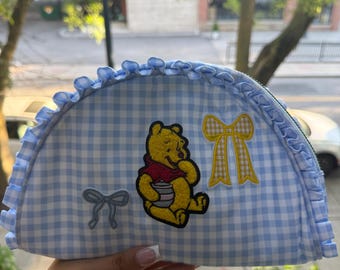 Disney Winnie the Pooh, blue and white checkered ruffled pouch with coquette bows