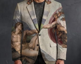 May include: A blazer featuring a printed reproduction of The Creation of Adam fresco. The jacket has a notched lapel, two front buttons, and two flap pockets. The print displays figures in skin tones against a marble-like background.