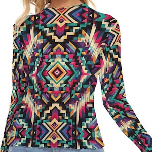 May include: A long-sleeved shirt with a geometric pattern in shades of pink, blue, green, yellow, and black. The shirt has a mock neck and a fitted silhouette.