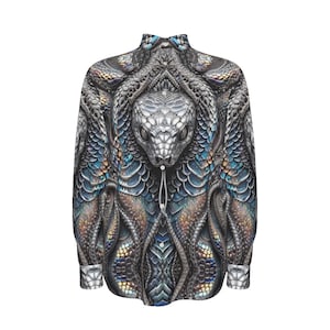 May include: A long-sleeved button-down shirt featuring a silver and blue snake print. The snake's head is positioned centrally on the front of the shirt.
