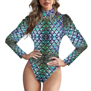May include: A long-sleeved bodysuit with a high neck and a green and blue iridescent scale pattern.