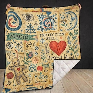 May include: A quilted blanket featuring a parchment-style background with various illustrations including a voodoo doll, a red heart, a crescent moon, an eye, and a snake. Text includes MAGIC, PROTECTION SPELL, hearst blood, and Lavender.