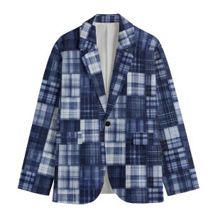 May include: A blue plaid blazer with a patchwork design. The blazer has a single-button closure and a white interior lining. The plaid pattern uses shades of blue and white, creating a stylish garment. The blazer is a classic fit.