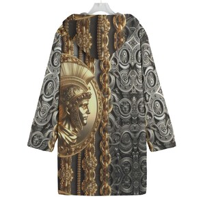 May include: A hooded sweatshirt with a gold and silver patterned design featuring a Roman soldier's head in a circular frame.
