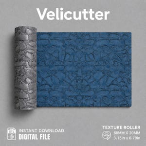 May include: A cylindrical texture roller labeled Velicutter with a stone pattern, shown next to a flat rectangular sample of the same blue stone texture. The digital file is for instant download and measures 3.15 inches by 0.79 inches.