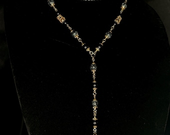 Black Glass Lariat Necklace with Bird Claw Pendant