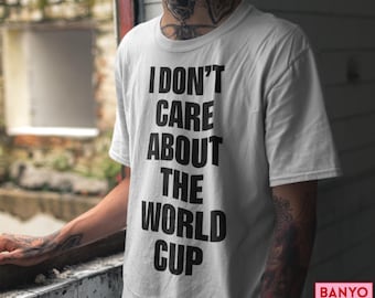 I Don't Care About World Cup T-shirt – grappig sarcastisch anti-hype T-shirt met grafische statement