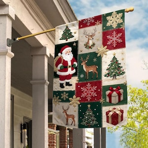 May include: A rectangular garden flag featuring a patchwork design with Christmas motifs including Santa Claus, reindeer, decorated pine trees, gift boxes with bows, and gold snowflakes on a background of red, green, and cream fabric panels.