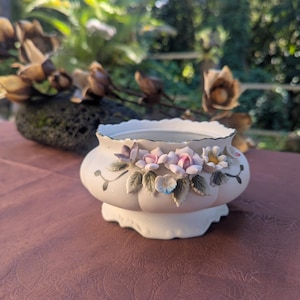 Vintage-style Capodimonte flower pot or centerpiece, romantic majolica or floral design. Matte white chalky finish. Italian retro.