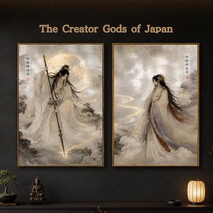 May include: Two rectangular wall art prints titled The Creator Gods of Japan. The left print shows a figure holding a long spear against a large moon. The right print depicts a figure in flowing robes. Both feature gold accents and Japanese text.