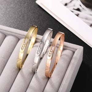 925 Silber / Gelbgold / Roségold Diamant Armreif Move Noa Geschenk für sie Drei-Diamanten bewegliches Armband
