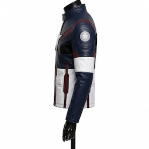May include: A multi-colored leather jacket featuring a stand-up collar, a white star emblem on the chest, and a circular silver star patch on the upper sleeve. The design incorporates panels of navy blue, white, and dark red with black mesh accents.