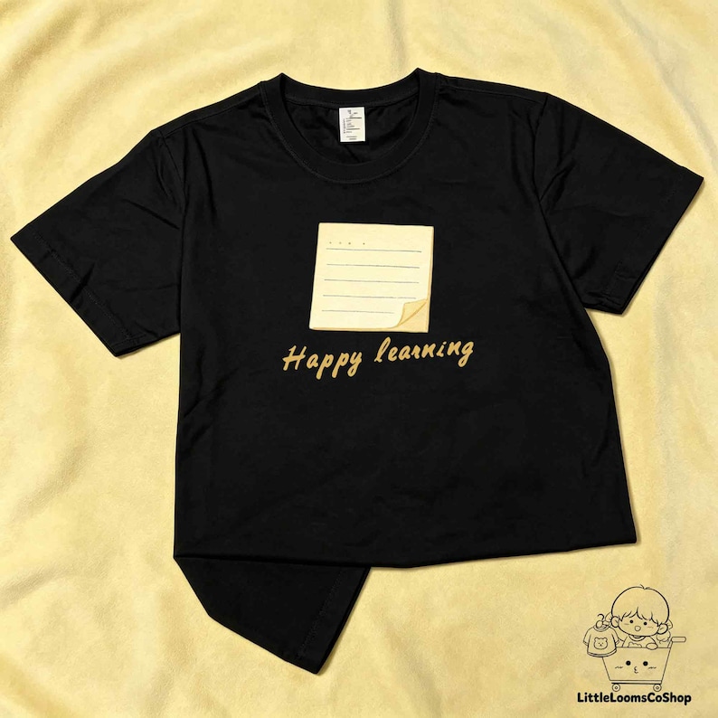 T-shirt perforé à lignes et motifs de notes - Collection 2026 ...