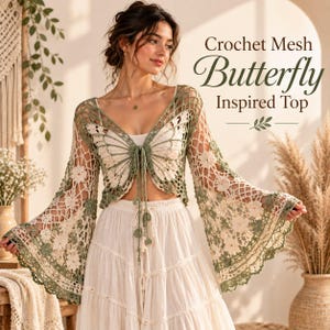 May include: A long-sleeved crochet mesh top featuring a butterfly-shaped pattern in cream and sage green. The garment has a deep V-neckline with a central tie closure and flared sleeves. The text "Crochet Mesh Butterfly Inspired Top" is visible.