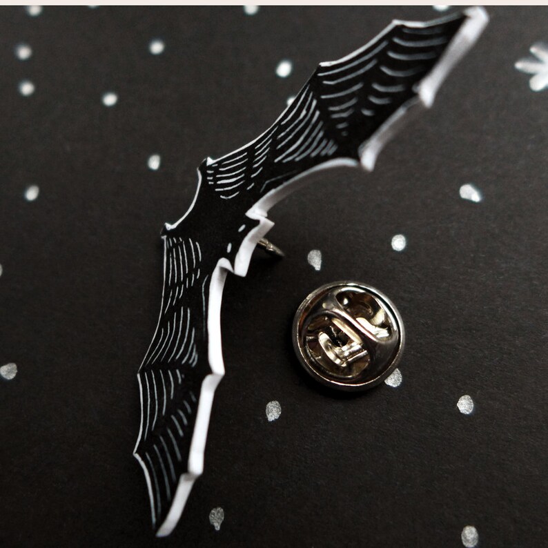 thumbnail interactive-video image 1 of British Artisan Signed Pewter Flying Bat Brooch Pin - Vampire Halloween Gothic 1 of 4