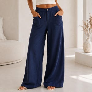 Pantalones de lino de talle alto y pierna ancha, pantalones fluidos de verano, cintura elástica, ropa informal con bolsillos.