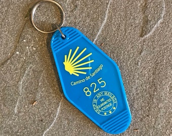 Camino de Santiago Retro Motel Keychain with the trail marker.