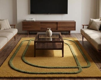 May include: A rectangular area rug featuring a mustard yellow base with raised, dark green, rounded geometric line patterns. The rug is positioned in a living room setting between two beige sofas, a wooden coffee table, and a media console.