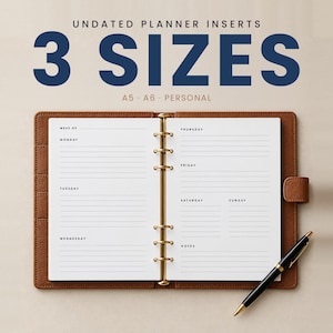 May include: An open brown leather binder with gold rings containing white undated weekly planner inserts. The text reads UNDATED PLANNER INSERTS 3 SIZES A5 A6 PERSONAL. A black and gold pen rests on the bottom right corner of the binder.