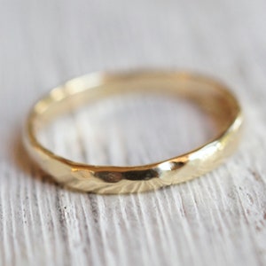 Half round gold ring.