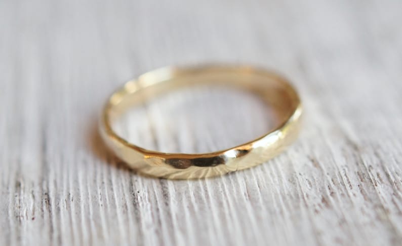 Half round gold ring.