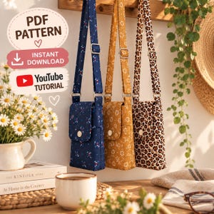 May include: Three crossbody bags with adjustable straps and flap closures. One bag is dark blue with a small floral pattern, one is mustard yellow with a white floral pattern, and one features a brown and black leopard print pattern.