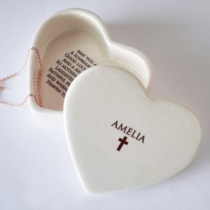 This lovely heart shaped keepsake box would be a perfect Christening, baptism , first communion, or confirmation gift. It is made of earthenware clay, has an Irish blessing prayer inside, and comes with a necklace or bracelet. Can be personalized.