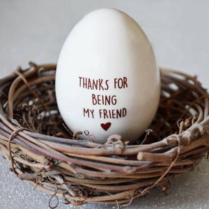 This Easter egg would be a unique Easter gift for any friend, family, co-worker or loved one. Can be used as an adorable easter basket stuffer. The front says 'You're a Good Egg' and the back says 'Thanks for being my friend'