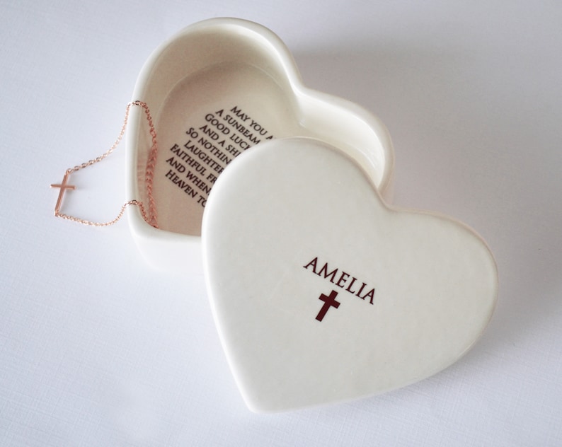 This lovely heart shaped keepsake box would be a perfect Christening, baptism , first communion, or confirmation gift. It is made of earthenware clay, has an Irish blessing prayer inside, and comes with a necklace or bracelet. Can be personalized.